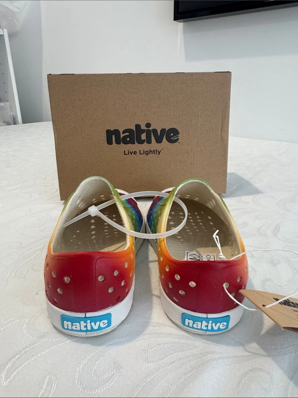 Native Kids Slip-On Sneaker in Rainbow Gradient. Size C8